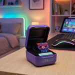 An open purple Bitzee Digital Pet pod displaying a vibrant, pixelated red cat character on a flexible screen that reacts to physical touch and interaction.